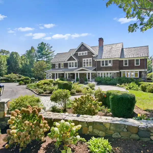EXTRAORDINARY RIVERSIDE ESTATE WITH TIMELESS COASTAL CHARM