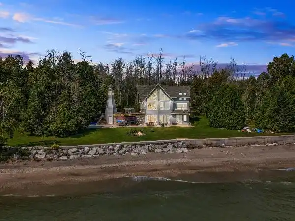 GRAND WATERFRONT RETREAT WITH PRIVATE BEACH