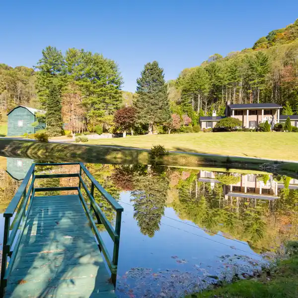 METICULOUSLY MAINTAINED HOME ON OVER 21 ACRES