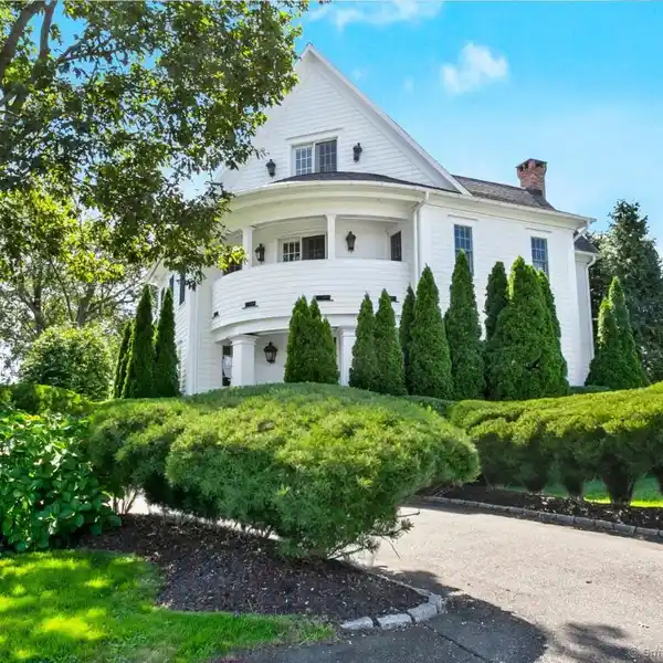 ARCHITECTURAL COASTAL GEM WITH PRIVATE GARDENS