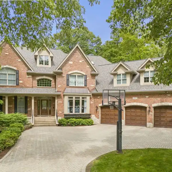 GRAND ALL-BRICK RESIDENCE IN PRESTIGIOUS BONNEMA WOODS