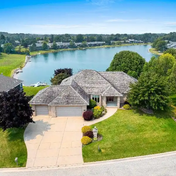 CUSTOM WALKOUT RANCH WITH PRIVATE DOCK
