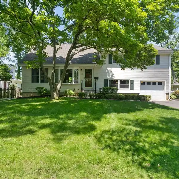 BEAUTIFULLY EXPANDED SPLIT-LEVEL HOME