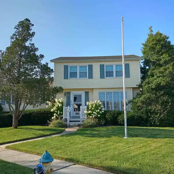 COASTAL CHARM STEPS FROM THE BEACH