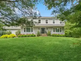Beautifully Updated Colonial in a Tranquil Setting