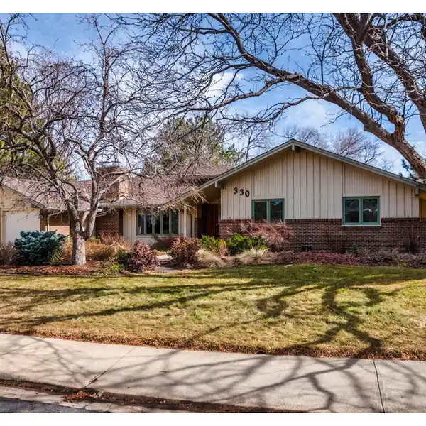 CLASSIC FRASIER MEADOWS RANCH WITH SPACIOUS ADDITION