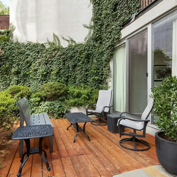 THOUGHTFULLY DESIGNED CONDO WITH PRIVATE BACKYARD