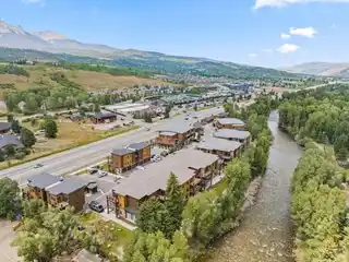Premier Top-Floor Riverfront Property