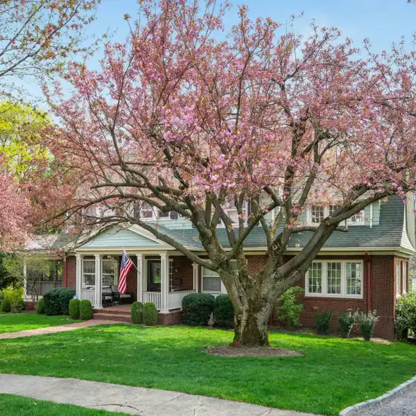 STUNNING SIX BEDROOM CENTER HALL COLONIAL