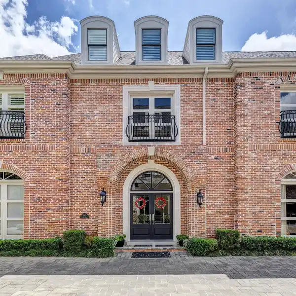STUNNING BRICK HOME IN A GATED ENCLAVE