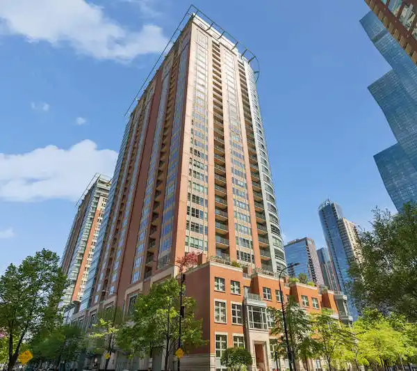 GORGEOUS CORNER UNIT STUNS WITH FLOOR-TO-CEILING WINDOWS