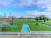 EXCEPTIONAL CONTEMPORARY HOME WITH BREATHTAKING GOLF VIEW