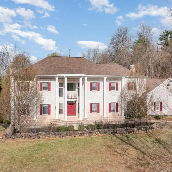 EXQUISITE COLONIAL HOME ON TWO ACRES